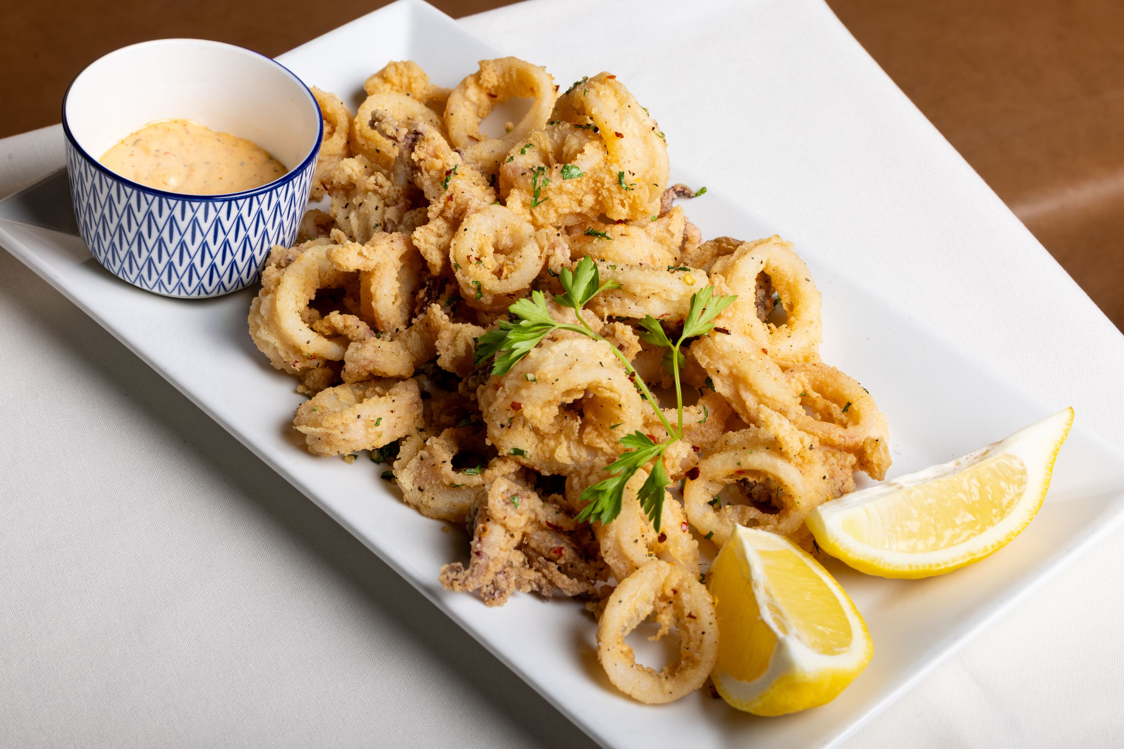 Golden fried calamari with lemon and aioli